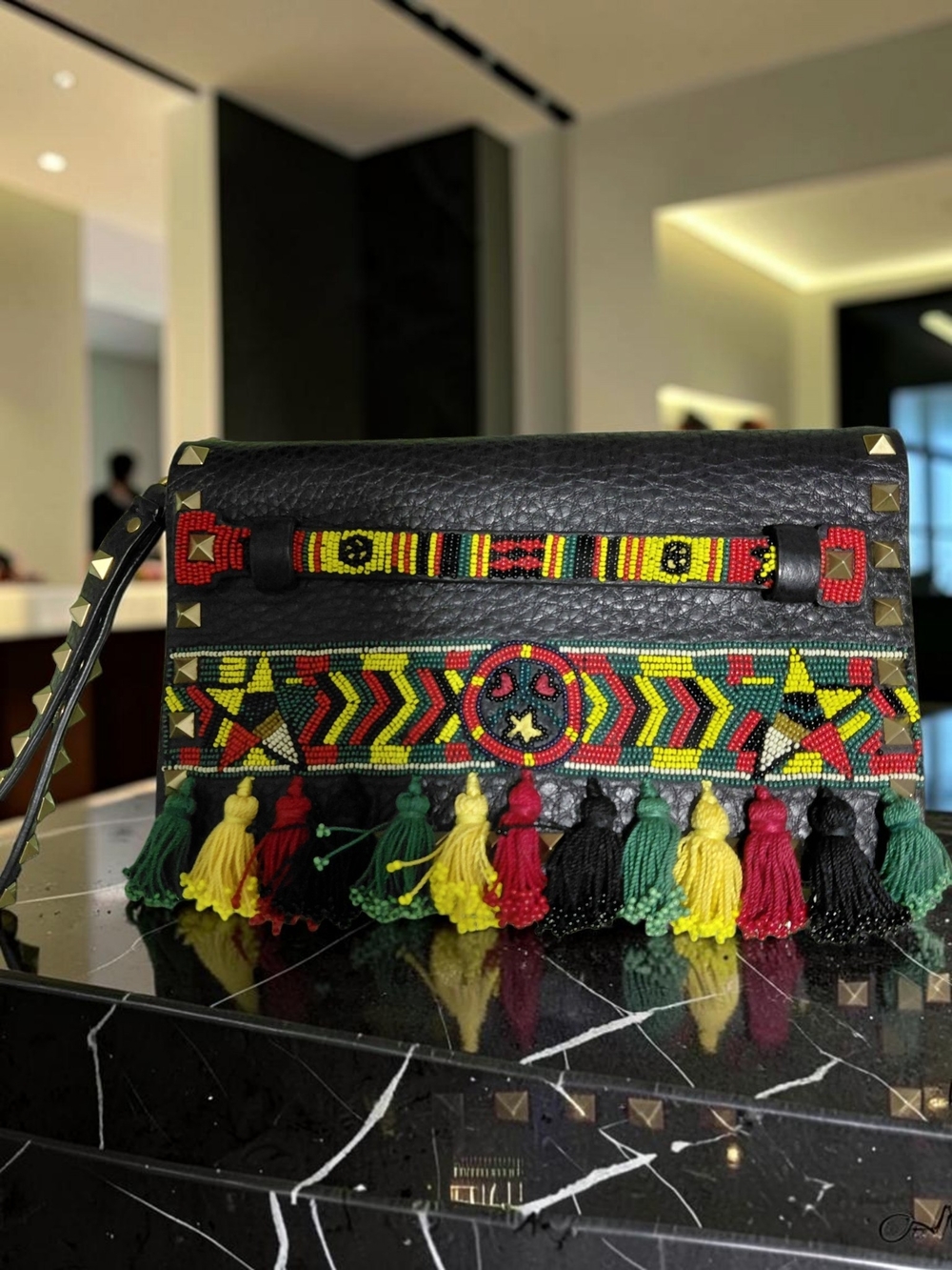 Valentino Garavani Black Leather Clutch with Red, Yellow, Green Tassels